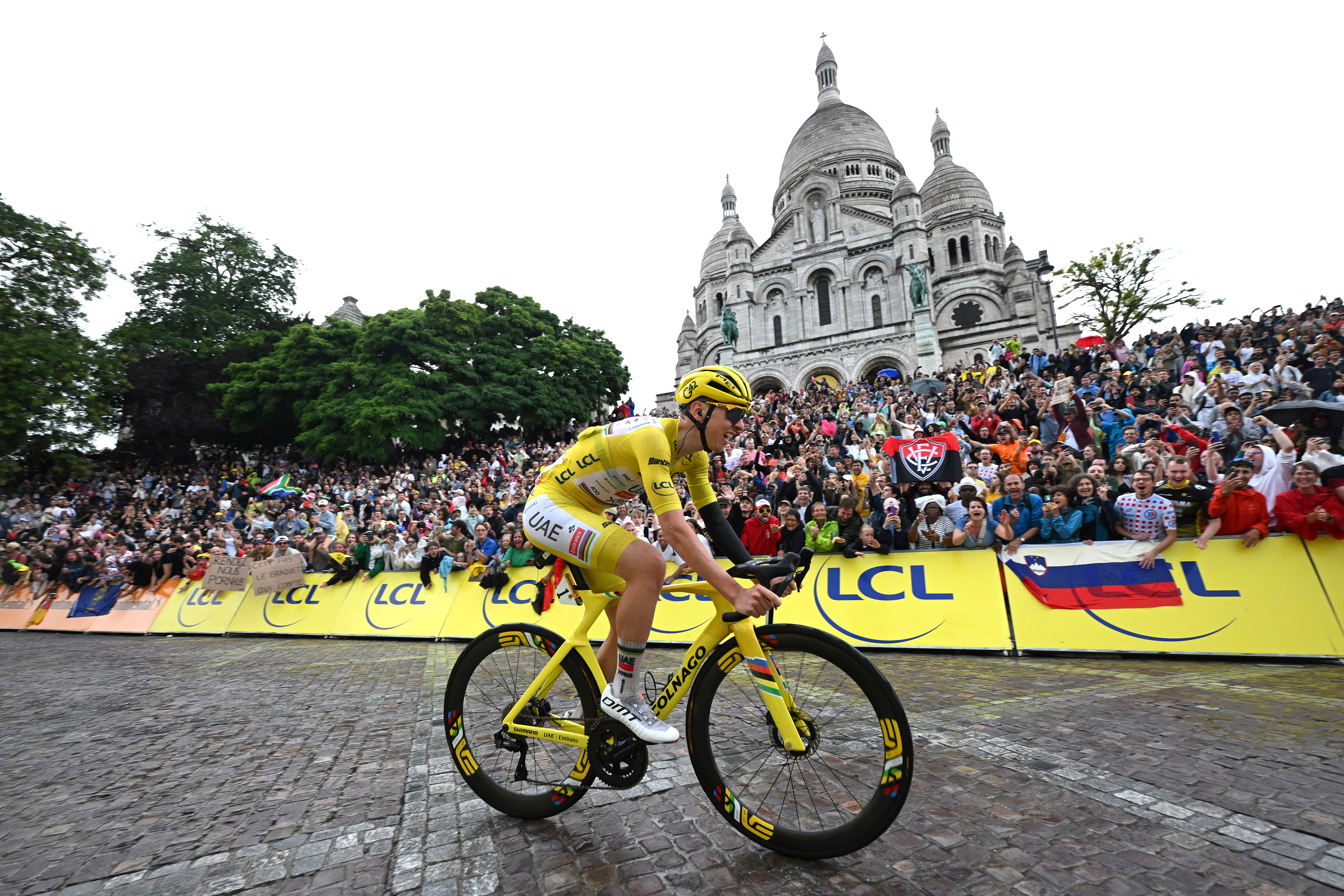 Tadej Pogacar in the yellow jersey going through Montmatre during the last day of the 2025 Tour de France