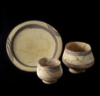 Pottery found at the foot of the skeleton during the excavation at the site of Ur in Iraq, now housed in the Penn Museum's Near East Section storage.