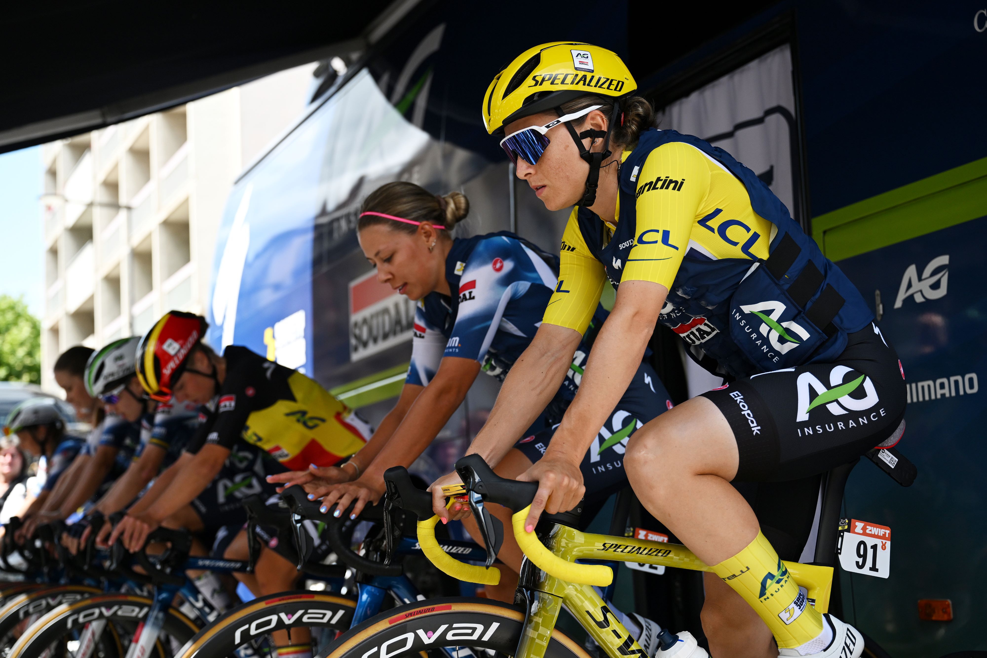 Kim Le Court and team warm up before stage 6 of the Tour de France Femmes 2025.