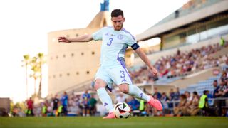 Scotland's Andy Robertson shapes up to deliver the ball in a June 2024 friendly match against Gibraltar.