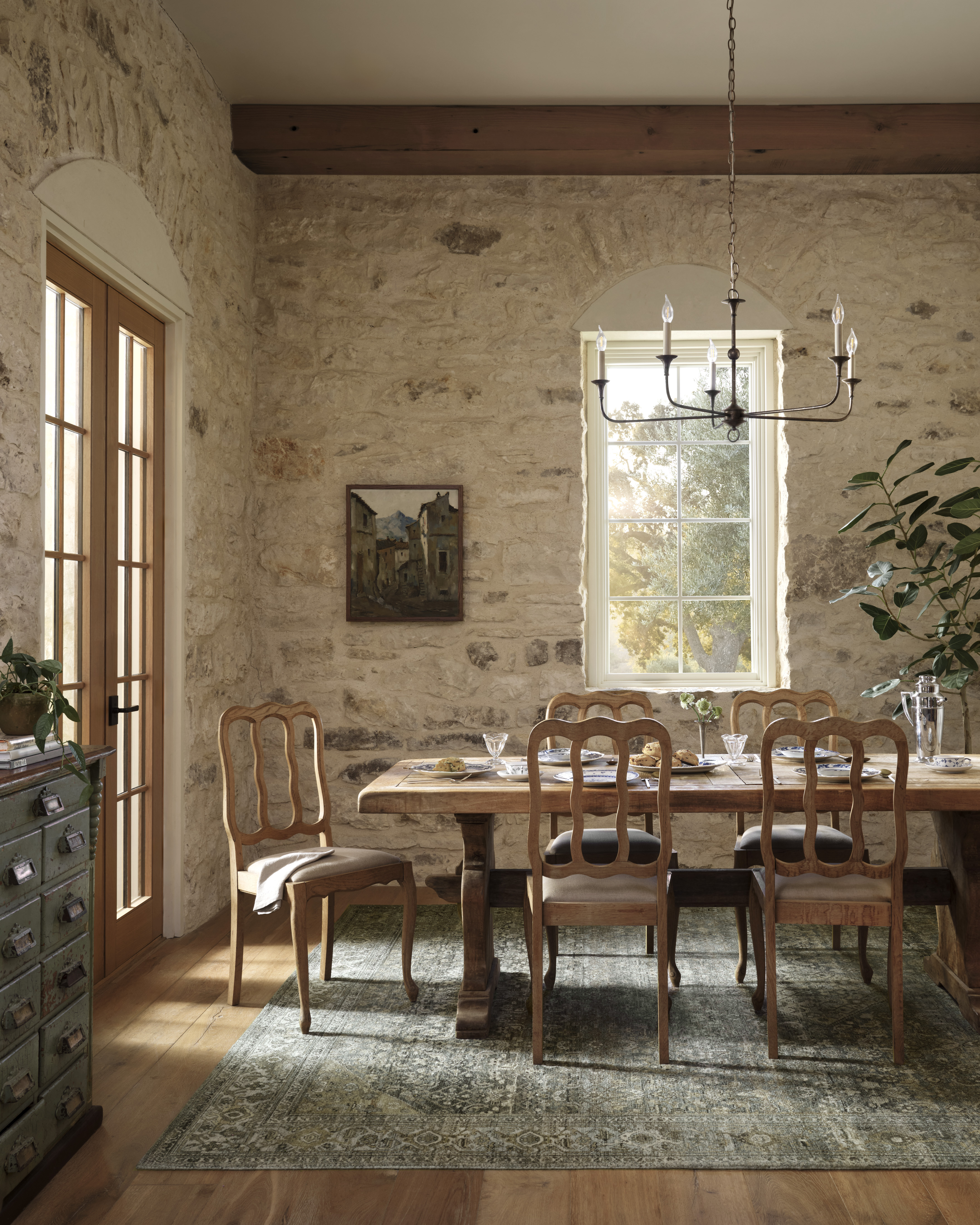 Joanna Gaines x Loloi vintage patterned run in sunlit dining room