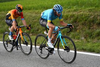 SAN DANIELE DEL FRIULI ITALY OCTOBER 20 Jan Tratnik of Slovenia and Team Bahrain Mclaren Manuele Boaro of Italy and Astana Pro Team Breakaway during the 103rd Giro dItalia 2020 Stage 16 a 229km stage from Udine to San Daniele Del Friuli 249m girodiitalia Giro on October 20 2020 in San Daniele Del Friuli Italy Photo by Tim de WaeleGetty Images