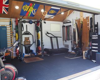 Nick Taylor's garage gym with extensive exercise equipment