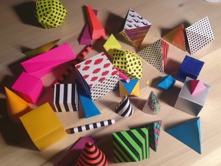 Multitasking production designer Tamara Hahn made all the geometric shapes out of paper