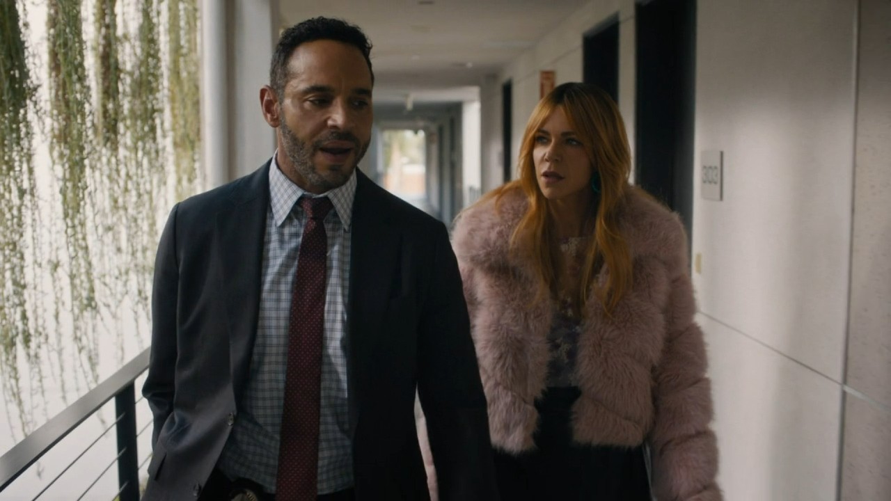 Daniel Sunjata and Kaitlin Olson walking and talking in High Potential.