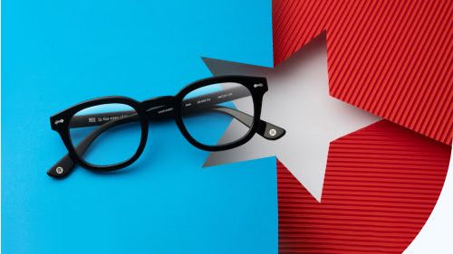 The GlassesUSA 4th July sale image showing a white star on a blue and red background