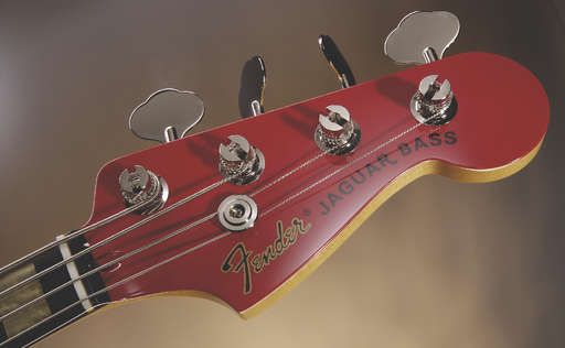 The headstock features classic open-geared tuners