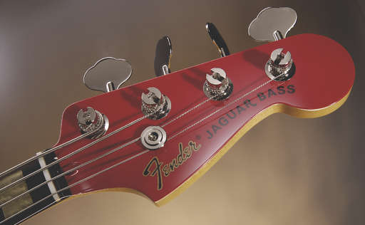 The headstock features classic open-geared tuners