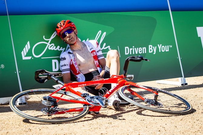 Peter Stetina (Trek-Segafredo) sits exhausted after crossing the line on stage 2 of the 2019 Tour of Utah