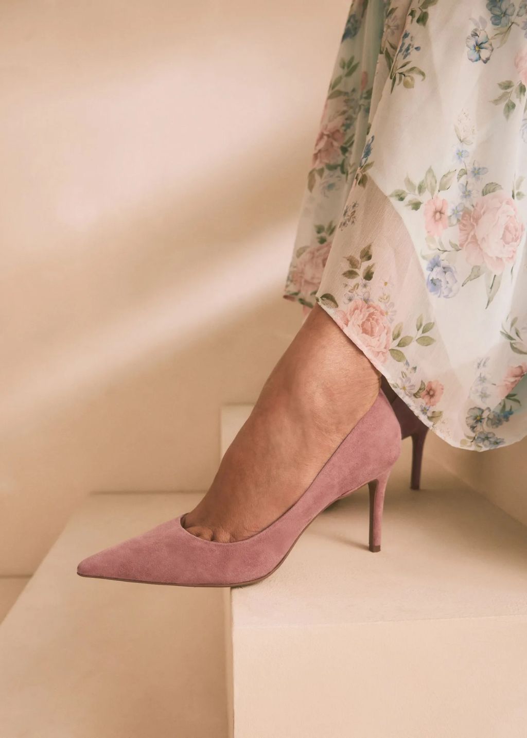 rose pink court shoes on model 