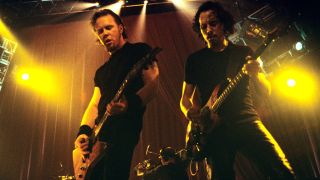 Metallica members James Hetfield and Kirk Hammett onstage in 1998