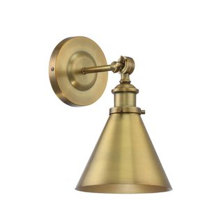 A cone-shaped brushed gold wall sconce with a circular base