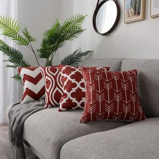 4 geometric burgundy throw pillows