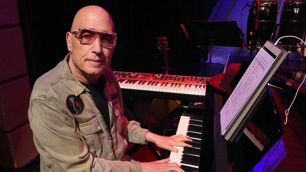 Mike Garson sitting at a piano