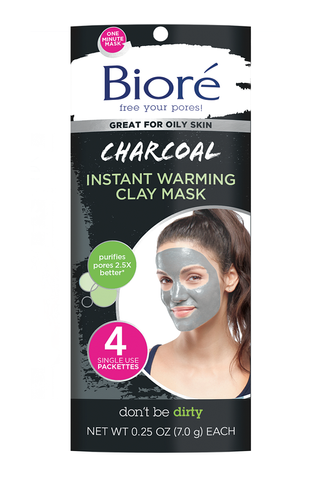 A pack of Charcoal Instant Warming Clay Mask set against a white background.