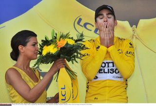 Tony Gallopin pulls on the yellow jersey at the Tour de France