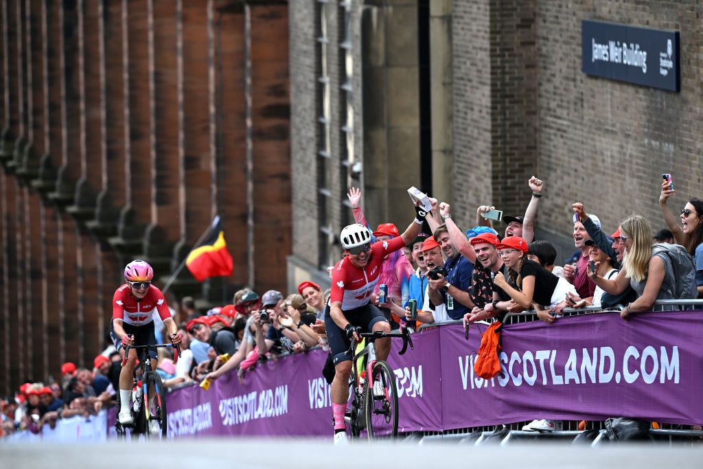 Alison Jackson of Canada waves the crowd in Glasgow