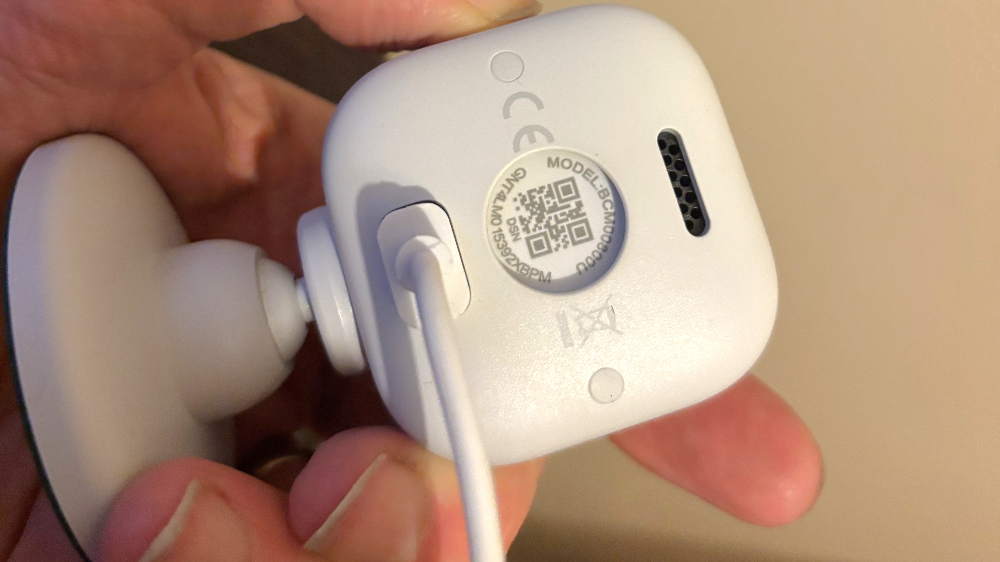 Back of Blink Mini 2 camera with charging cable