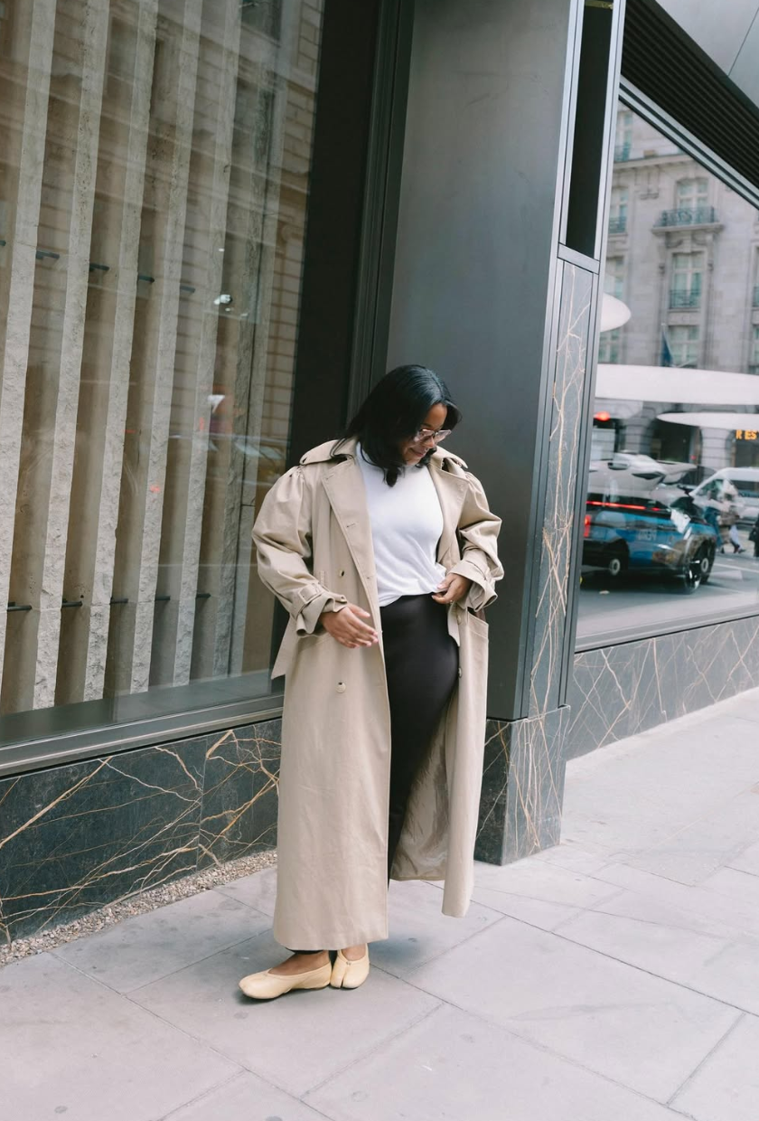 An image of @styleidealist wearing leather capri pants with a white t-shirt, Maison Margiela Tabi ballet flats and a trench coat.