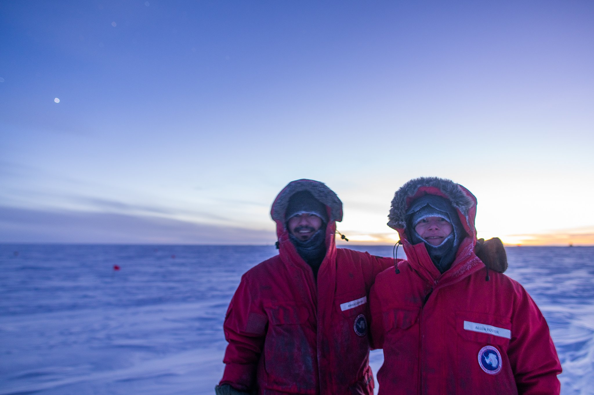 The polar expeditioners wear layers and layers of clothing to protect themselves against the cold.
