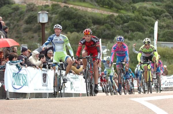 Daniel Oss (Liquigas-Cannondale) celebrates his teammate Peter Sagan's win while Alessandro Ballan (BMC) take second place.