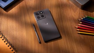 The Moto G Stylus 2026 next to the pen on a table