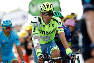 A bandaged and bruised Alberto Contador finishes stage 1 of the Tour de France after a crash earlier in the day.