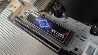 The Biwin Black Opal NV7400 SSD out of its packaging and installed in a PC.