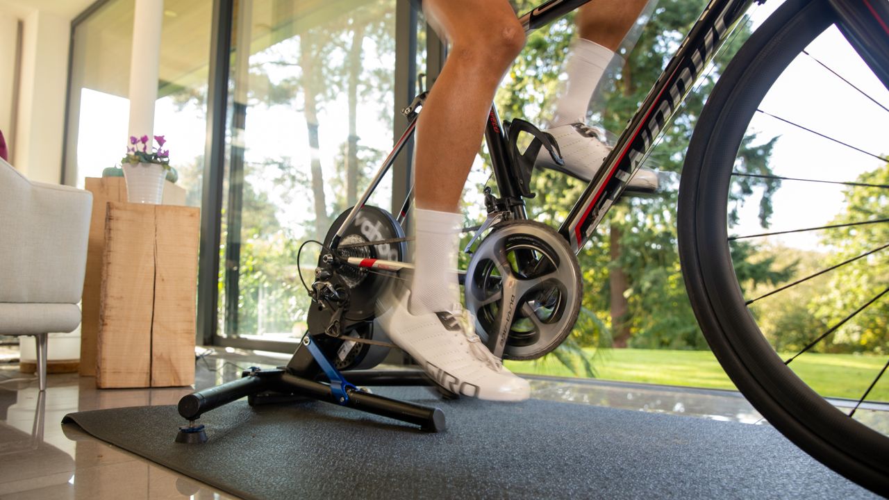 Male rider completing a cycling workout which targets pedalling efficiency