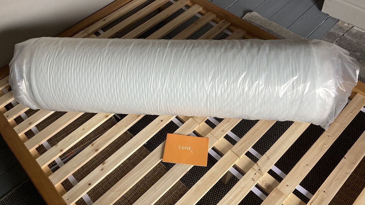 Lola Cool Hybrid mattress rolled up in plastic