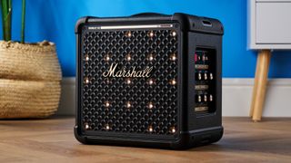 A black and brass Marshall Bromley 150 portable party speaker