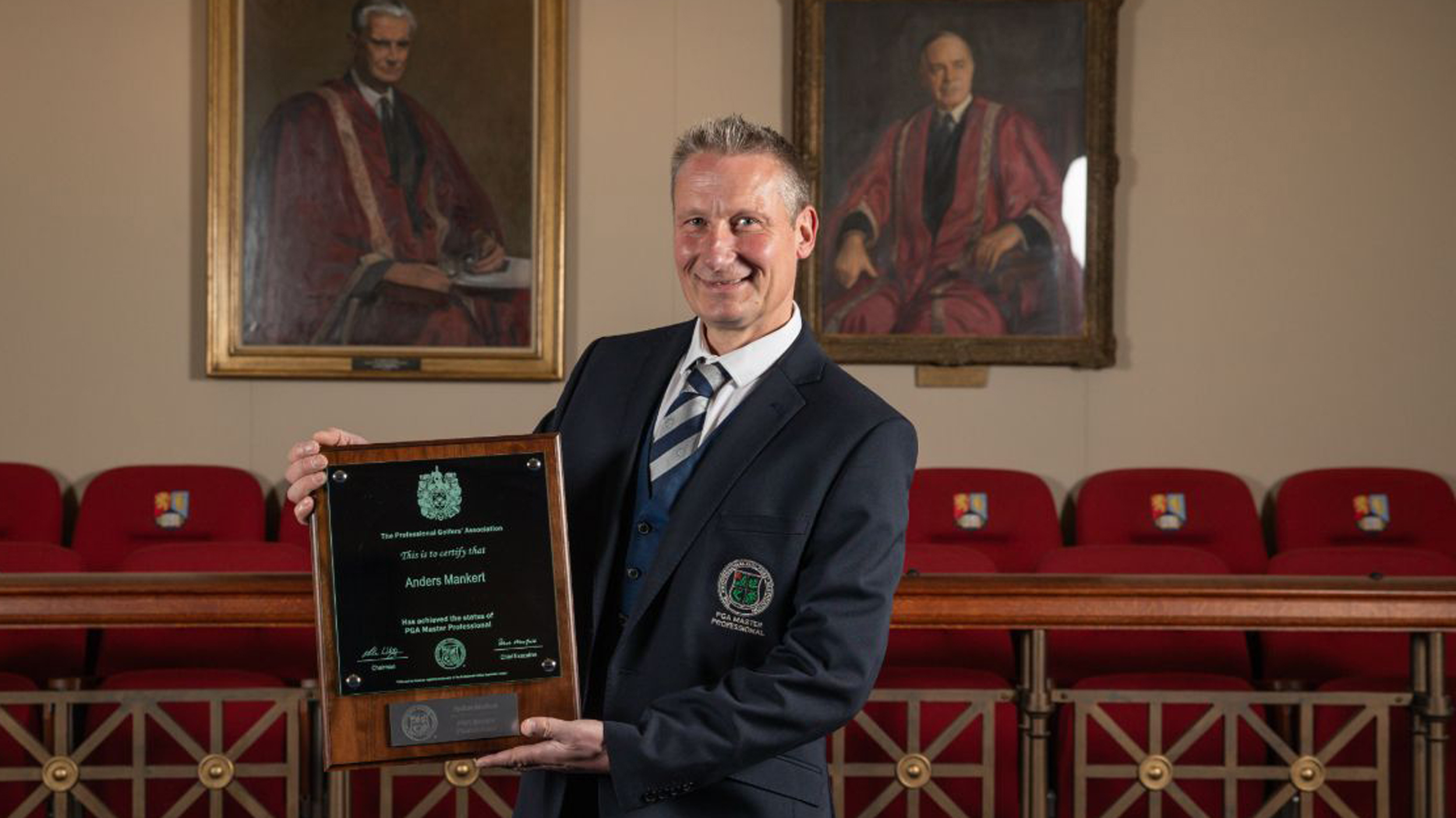 Golf Monthly Top 50 Coach Anders Mankert poses with his Master of the PGA plaque