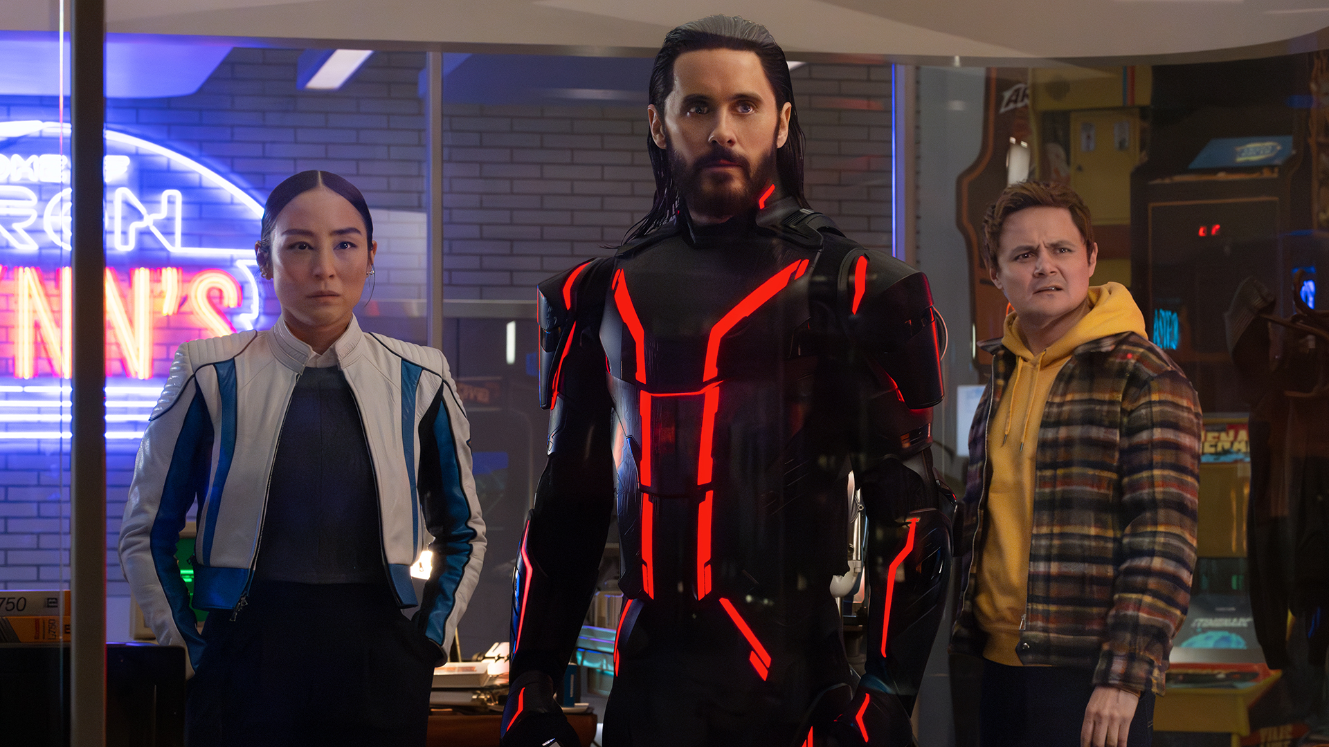 Eve, Ares, and Seth standing in a room in Tron: Ares
