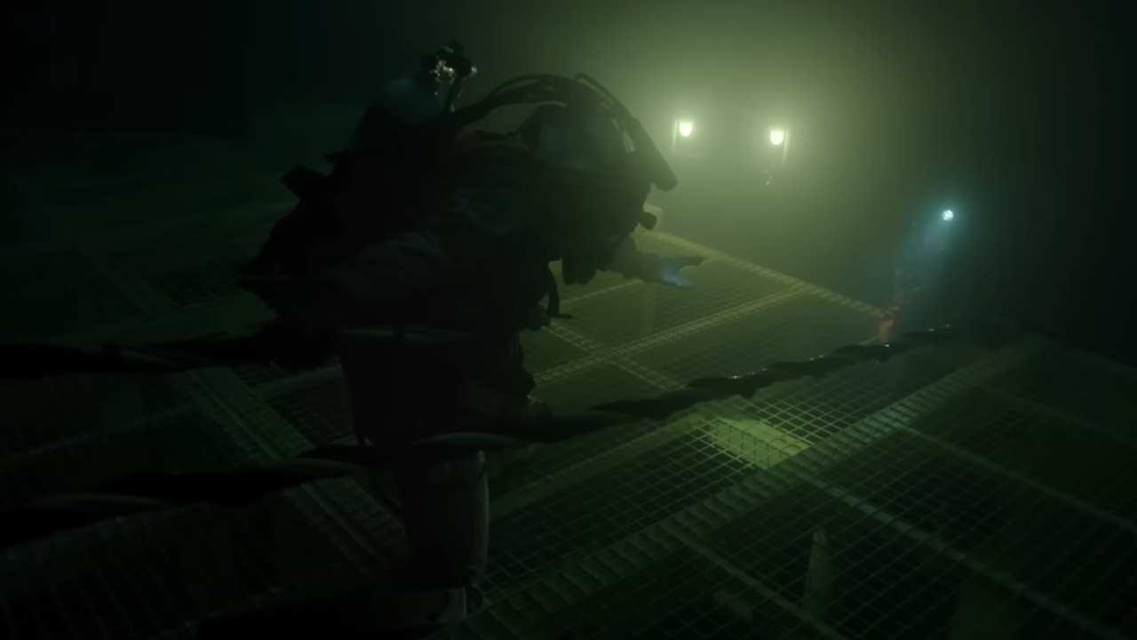 A diver reaching for another diver in Last Breath