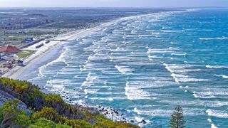 An aerial view of Muizenberg beach, a popular surf beach south of Cape Town in South Africa.