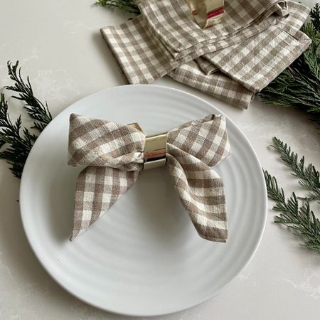 A checked napkin folded into a bow