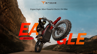 A young rider pulling a wheelie on an off-road ride of the ENGWE Eagle dirt bike