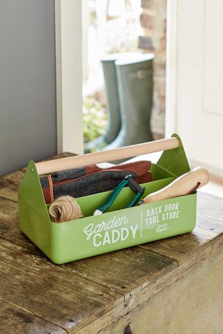 garden caddy used to hold tools and seeds