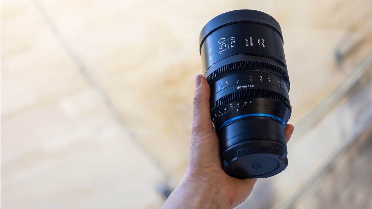 Irix Cine 150mm lens being unboxed by photographer