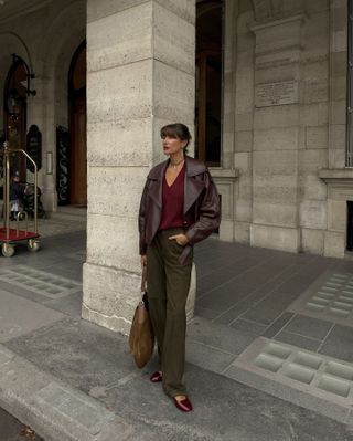 woman in burgundy sweater and olive pants