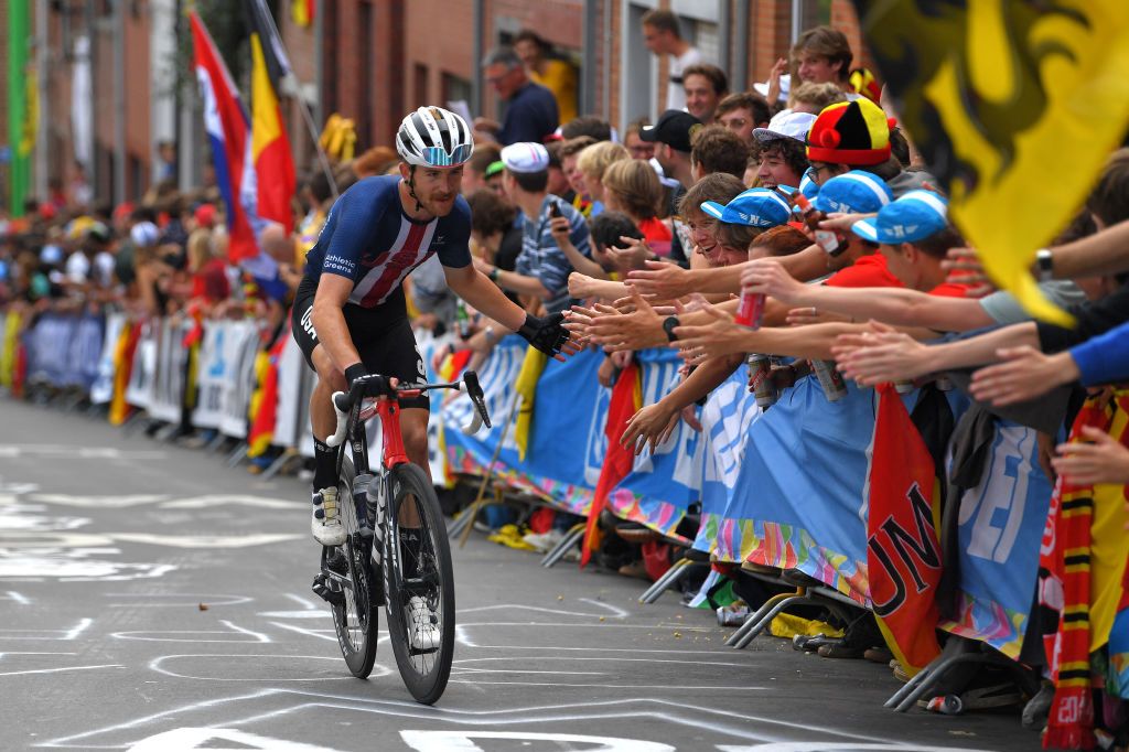 LEUVEN BELGIUM SEPTEMBER 26 Quinn Simmons of The United States waves the crowd during the 94th UCI Road World Championships 2021 Men Elite Road Race a 2683km race from Antwerp to Leuven flanders2021 on September 26 2021 in Leuven Belgium Photo by Luc ClaessenGetty Images