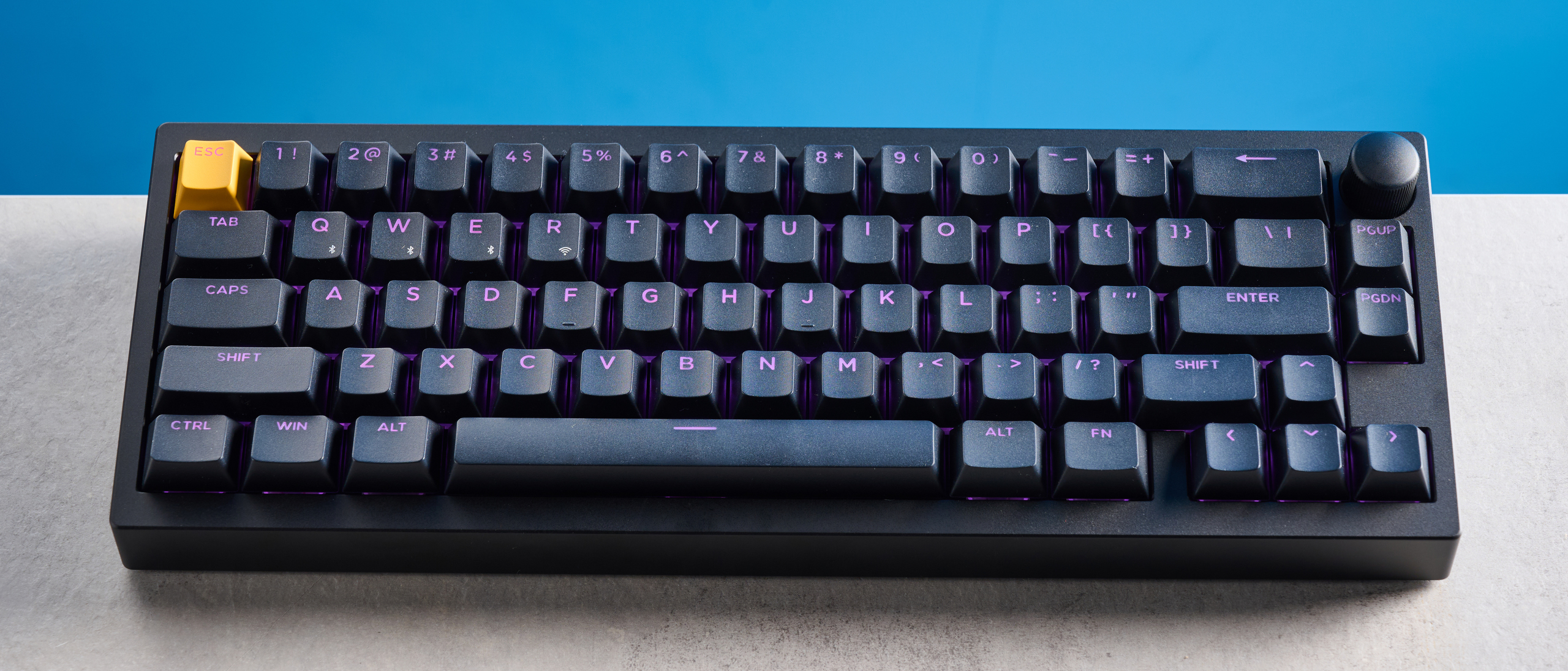 Lemokey P2 HE on a stone surface with a blue background