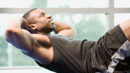 Man performing sit-ups