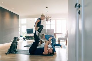 Exercise motivation: A mother working out at home