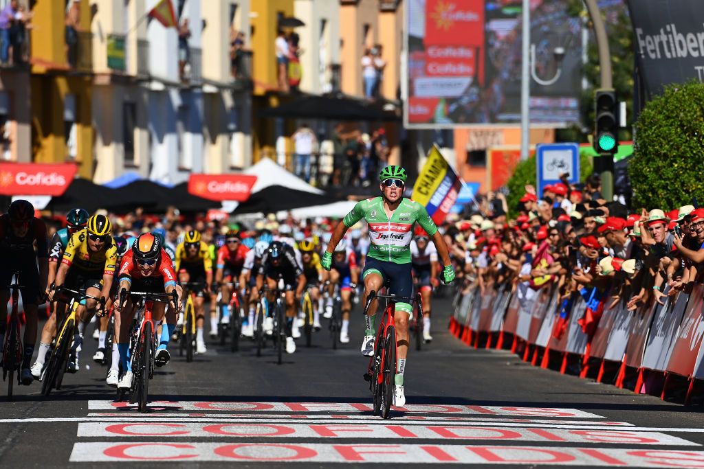 TALAVERA DE LA REINA SPAIN SEPTEMBER 09 Mads Pedersen of Denmark and Team Trek Segafredo Green Points Jersey celebrates at finish line as stage winner ahead of Fred Wright of United Kingdom and Team Bahrain Victorious and Gianni Vermeersch of Belgium and Team AlpecinDeceuninck during the 77th Tour of Spain 2022 Stage 19 a 1383km stage from Talavera de la Reina to Talavera de la Reina LaVuelta22 WorldTour on September 09 2022 in Talavera de la Reina Spain Photo by Tim de WaeleGetty Images