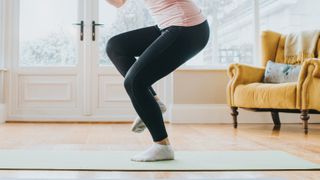 Woman balancing on one foot