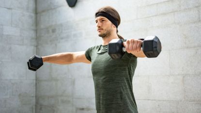 Man exercising with dumbbells