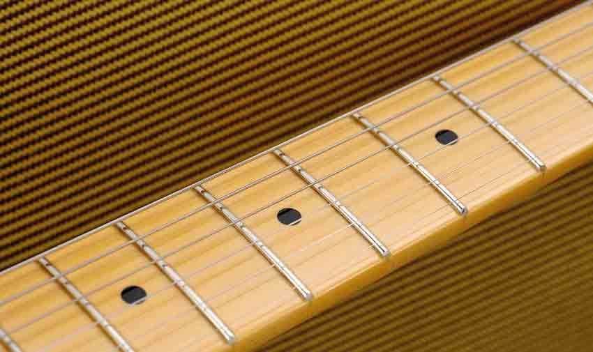 The comfy D-shaped, satin-finished neck is one-piece maple