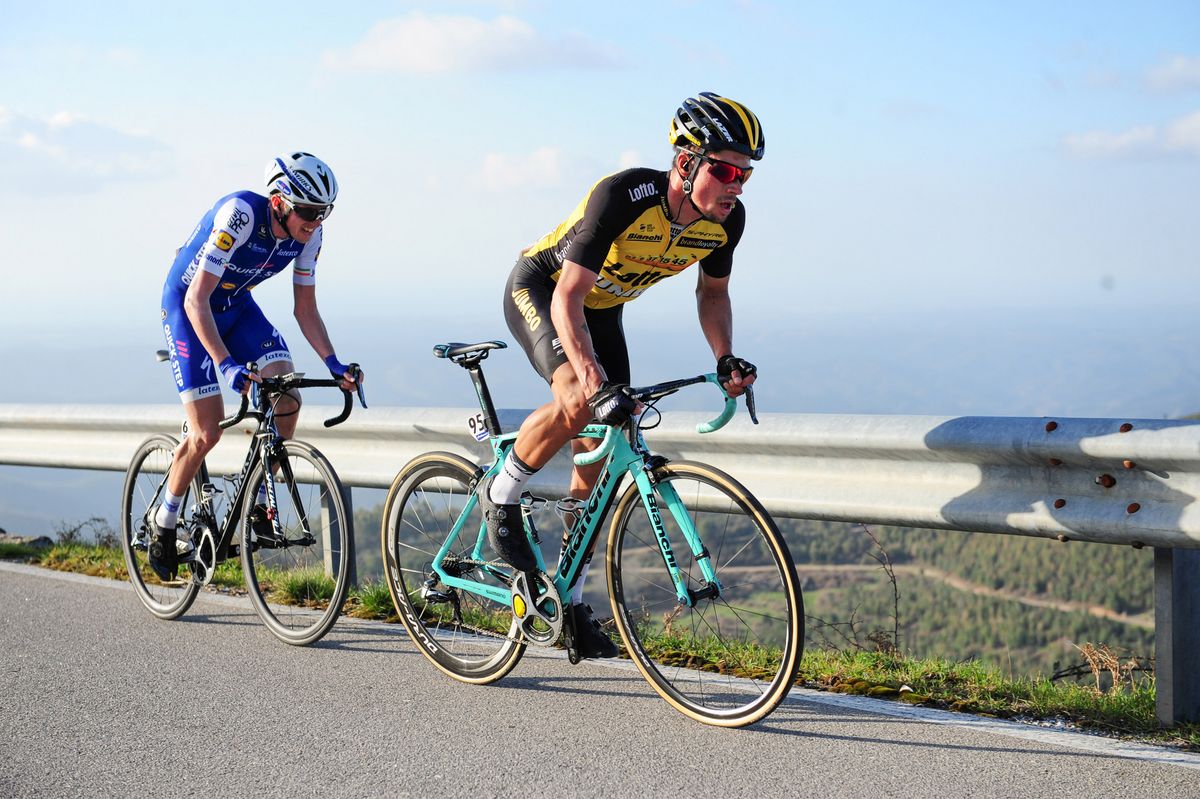 Primoz Roglic leads Dan Martin in the climb