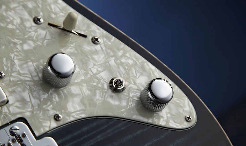 The three-way toggle splits the bridge 'bucker or adds some passive mid-boost